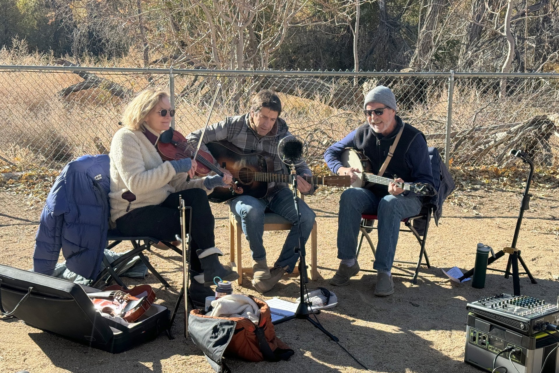 Hay Blackbird, a local Bluegrass trio with Ray Finch, Howie Schwartz and Anna Montgomery, performs at the centennial picnic at Lone Pine’s Spainhower Park on Saturday, November 16, 2024. The Rolling Chef served lunch during a windy, chilly afternoon.