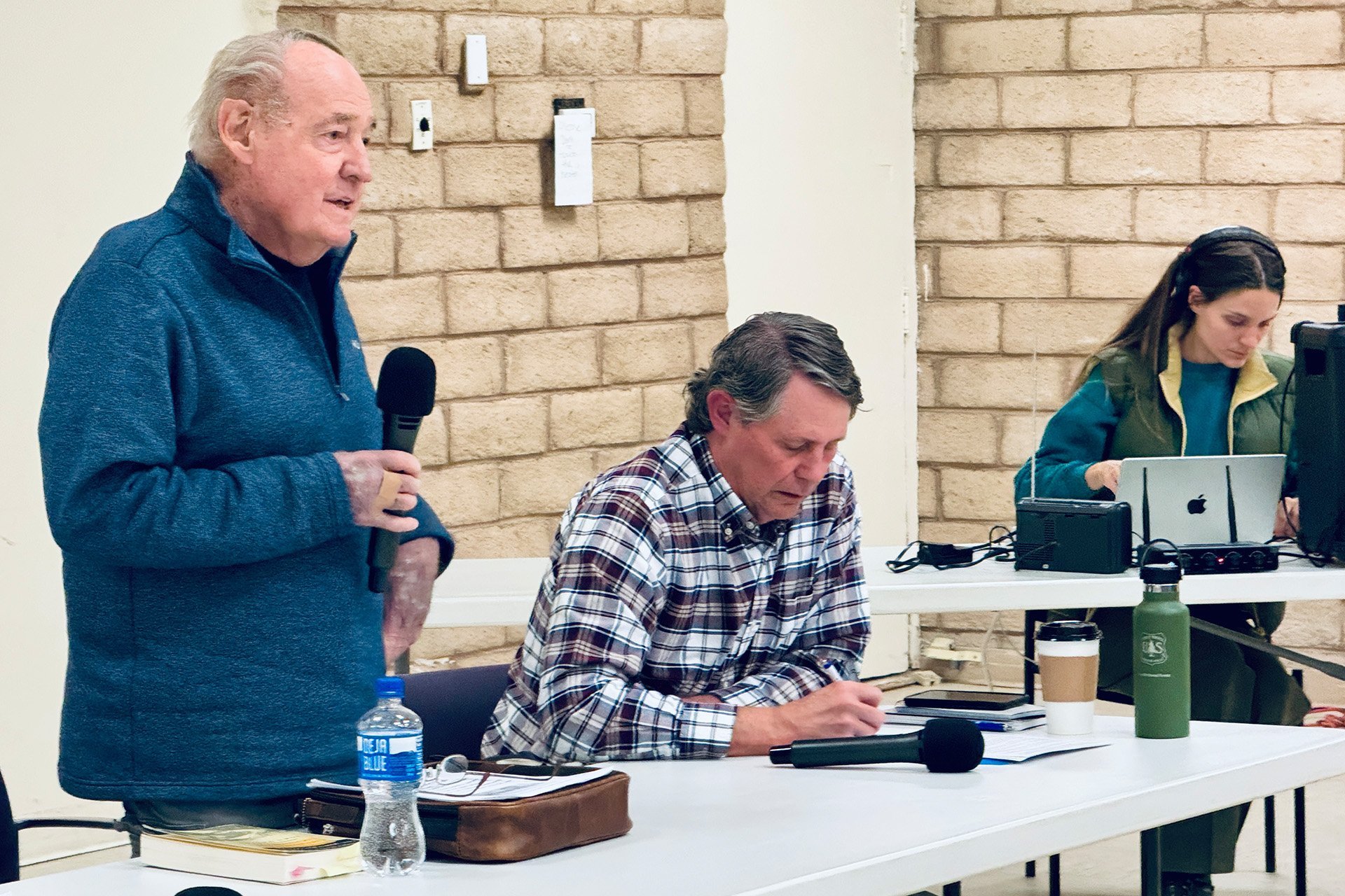 John Walton (left), our Alabama Gates 2024 keynote panelist, addresses the audience, with Jon Klusmire (center) and Audrey Clementine Turner (right).